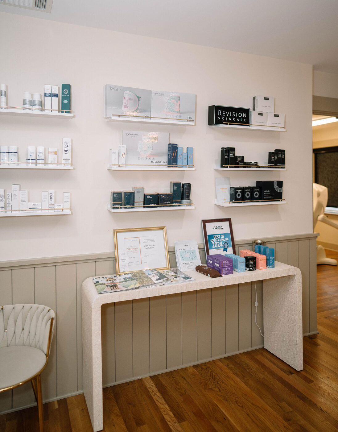 Medical-grade skincare retail wall at Aiken Medical Aesthetics